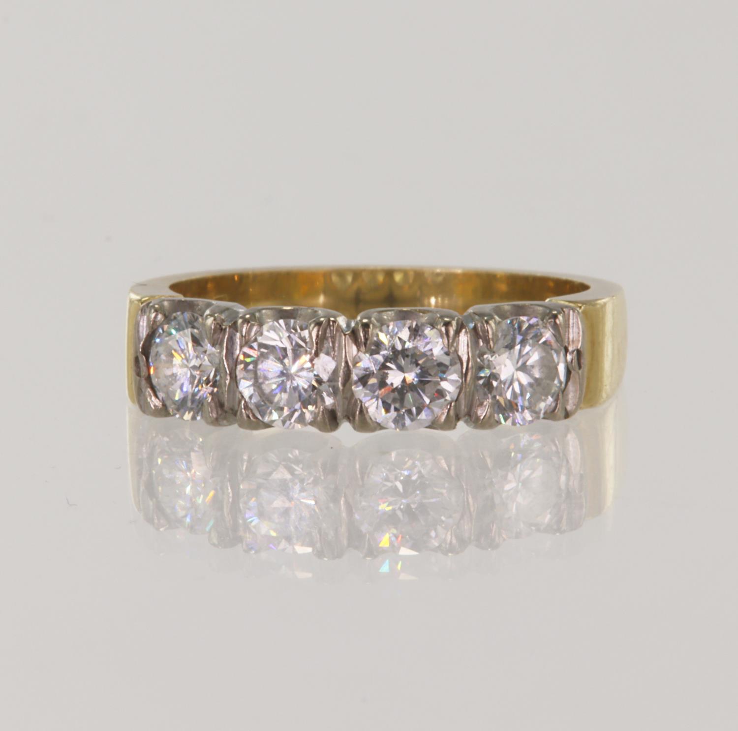 Yellow gold (tests 18ct) diamond four stone ring, four round brilliant cut diamond approx 0.30ct