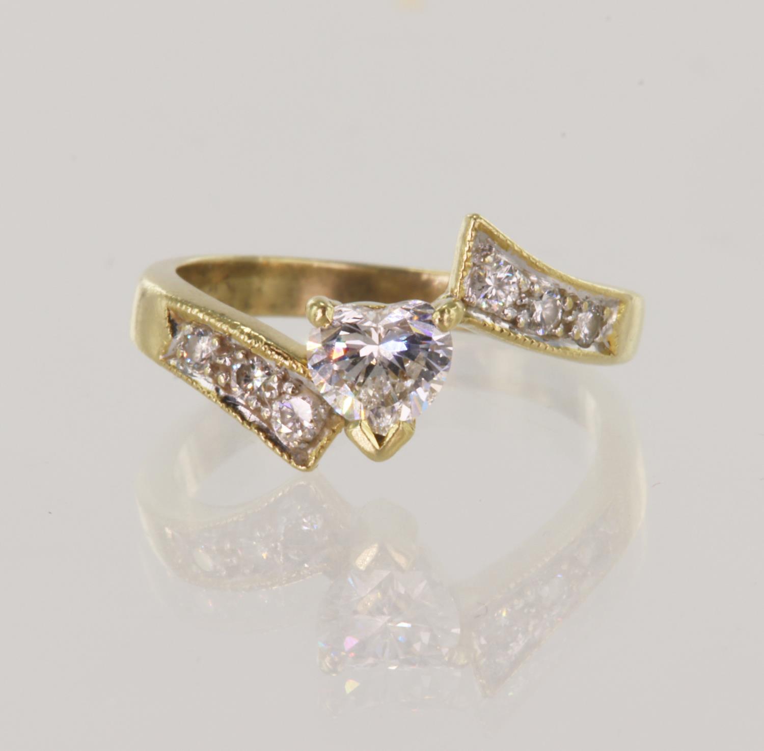 Yellow gold (tests 18ct) diamond solitaire ring, one fancy-heart cut diamond approx 0.39ct,