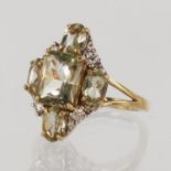 Yellow gold (tests 14ct) zultanite and diamond lozenge shaped dress ring, set with five zultanite's,