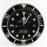 Advertising Wall Clock. Black 'Rolex' style advertising wall clock, black dial reads 'Rolex Oyster