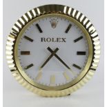 Advertising Wall Clock. gold 'Rolex' style advertising wall clock, with a white dial , diameter 34cm