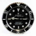 Advertising Wall Clock. Black 'Rolex' style advertising wall clock, black dial reads 'Rolex Oyster