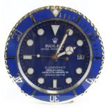 Advertising Wall Clock. Blue/gold 'Rolex' advertising wall clock, blue dial reads 'Rolex Oyster