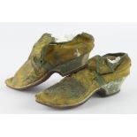 Chinese interest. A pair of silk embroidered Chinese shoes, circa 19th Century, length 19cm approx.