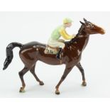 Beswick horse & jockey with green and yellow silks, no. 24 to saddle, height 21cm approx.
