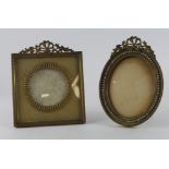 Picture Frames. Two ornate gilt brass picture frames, largest frame diameter 20cm approx.