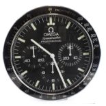 Advertising Wall Clock. Black & chrome 'Omega' advertising wall clock, black dial reads 'Omega