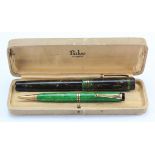 Parker Duofold Lucky Curve green marble fountain pen, together with a Parker Duofold green marble