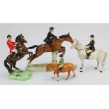 Beswick. Four Beswick horses with riders (one with ear repaired), tallest 25cm approx.