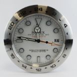 Advertising Wall Clock. Silver 'Rolex' style advertising wall clock (Explorer II) with a white dial,