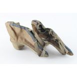 Chinese interest. A pair of silk embroidered Chinese shoes, circa 19th Century, length 14cm approx.
