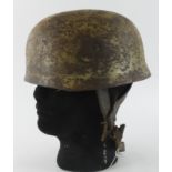 German Para Helmet with liner and chinstrap, liner maker stamped, decals still partly visible