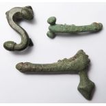 Antiquities (3): Roman bronze phallic amulets/brooches: S-shaped fibula 29mm, 8.09g, missing pin; an