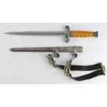 German Army Dagger with scabbard and hangers. Blade maker marked 'WKC Solingen'.