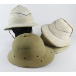 Military pith helmets four different patterns.