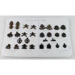 Collar badges - collection of Officers Bronze badges on white card (14 pairs)