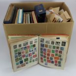 Large box of World stamps, the vast majority used in packets, some sorted by country and in