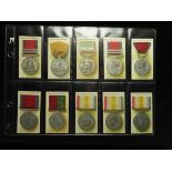 Taddy - British Medals & Ribbons, complete set in pages mainly G or better cat value £750