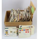 Box with a diverse accumulation of World (no GB) FDC's and Commercial mail. Many countries