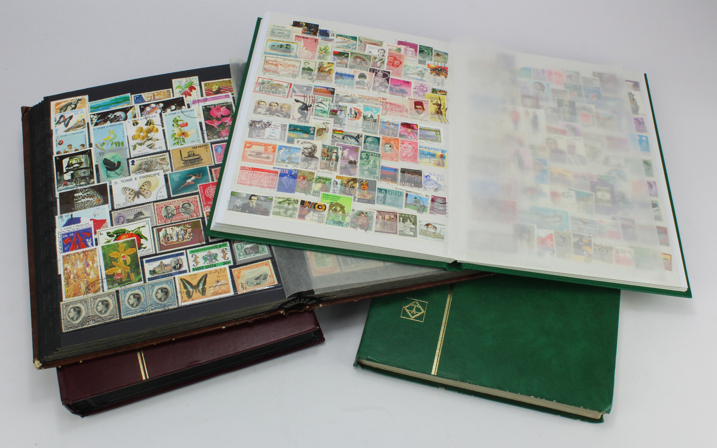 Lots of loose stamps housed in well filled stockbooks (4)