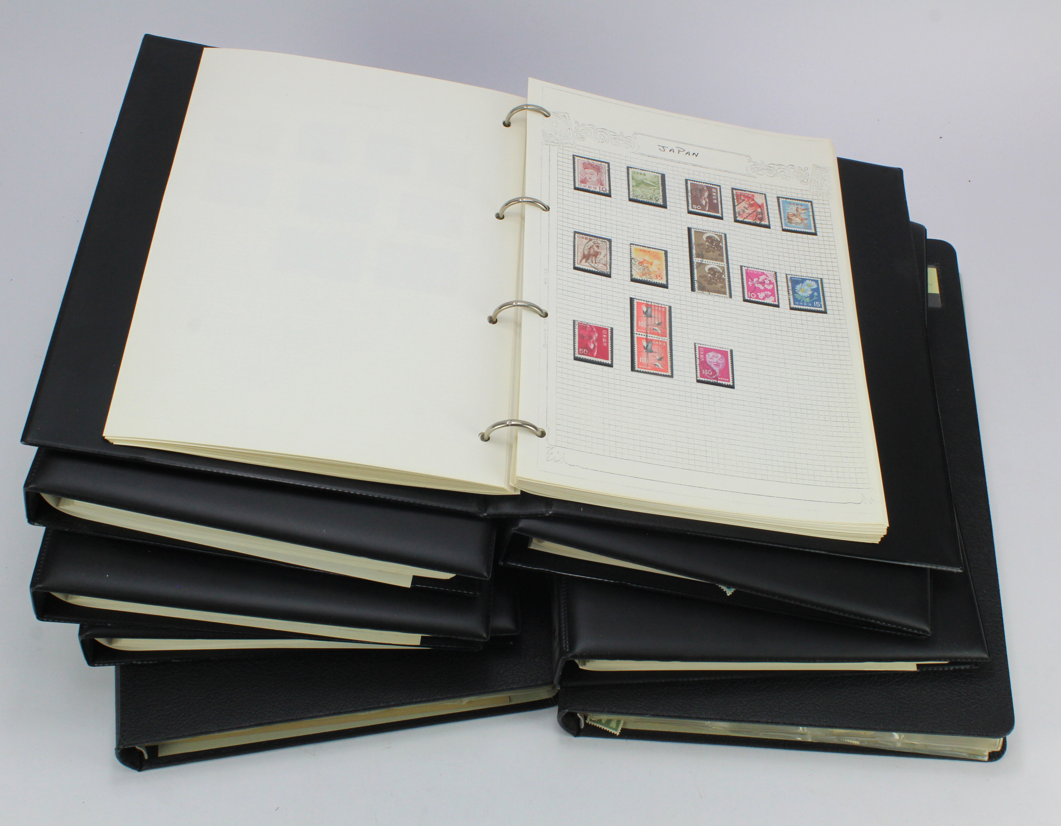 World mix sorted alphabetically into various ring binders, general range, but lots of it (Buyer