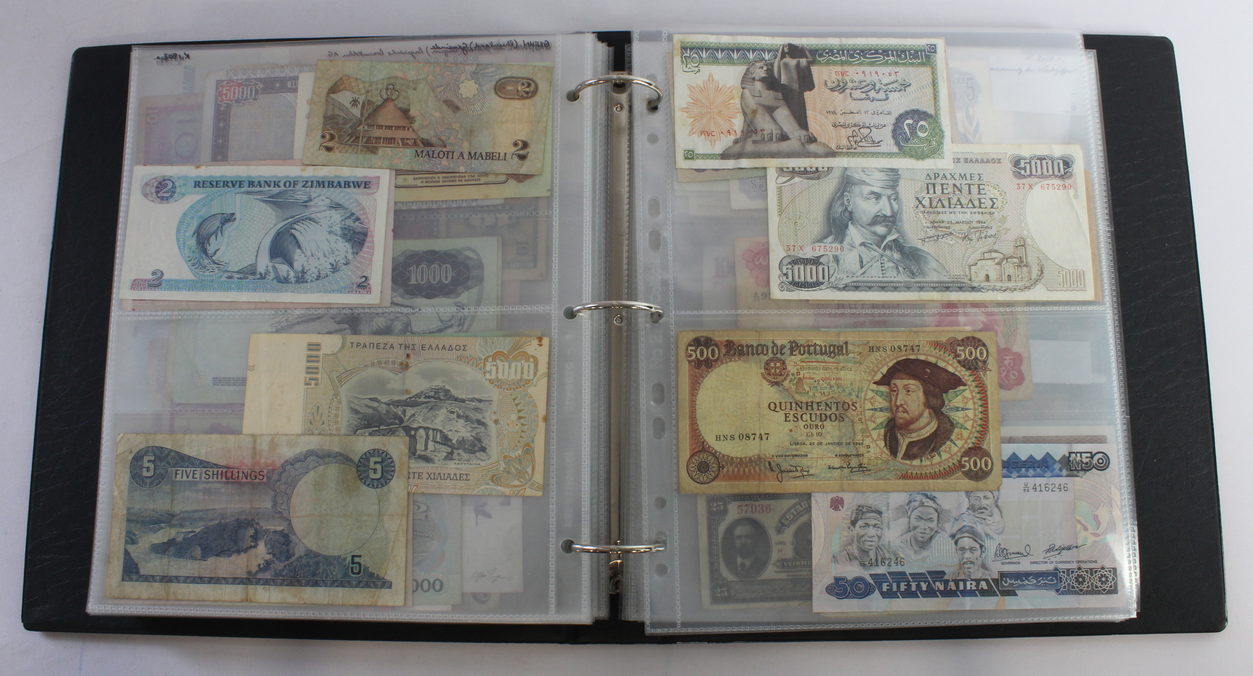 World (164), an album of mixed world notes to include USA fractional 50 Cents 1863, Hong Kong - Image 33 of 47