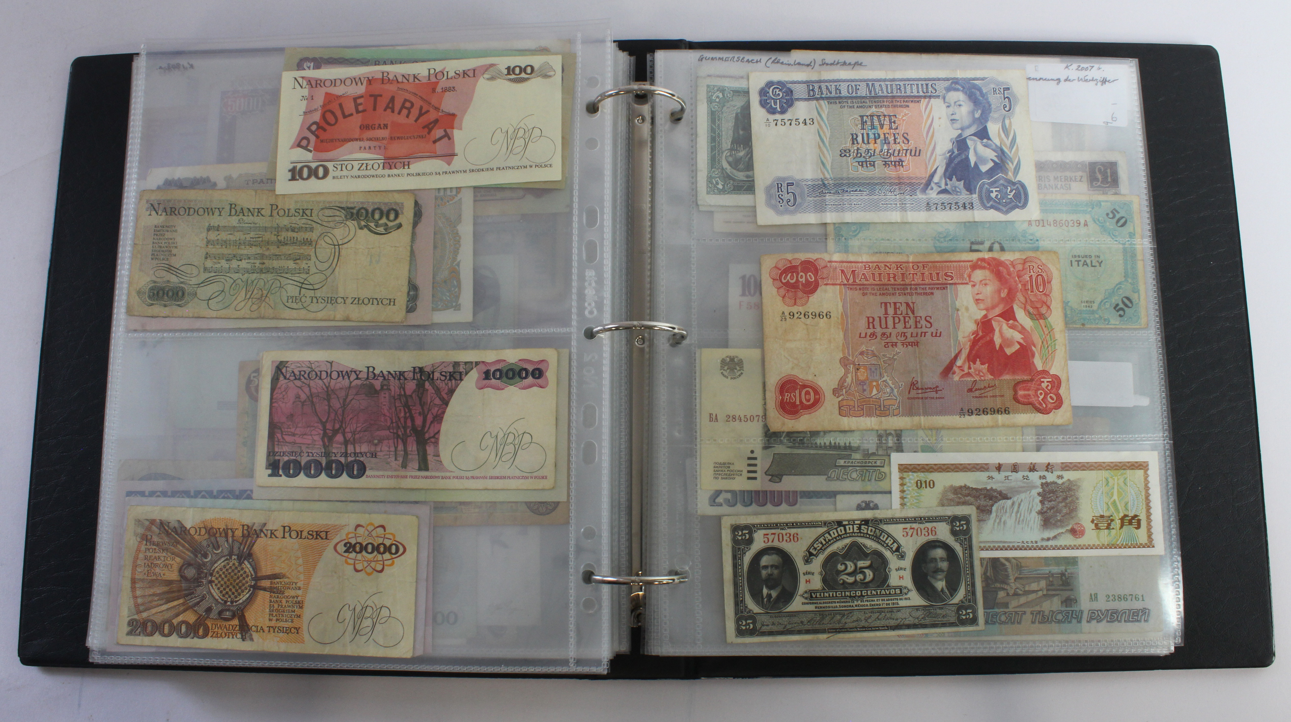 World (164), an album of mixed world notes to include USA fractional 50 Cents 1863, Hong Kong - Image 36 of 47