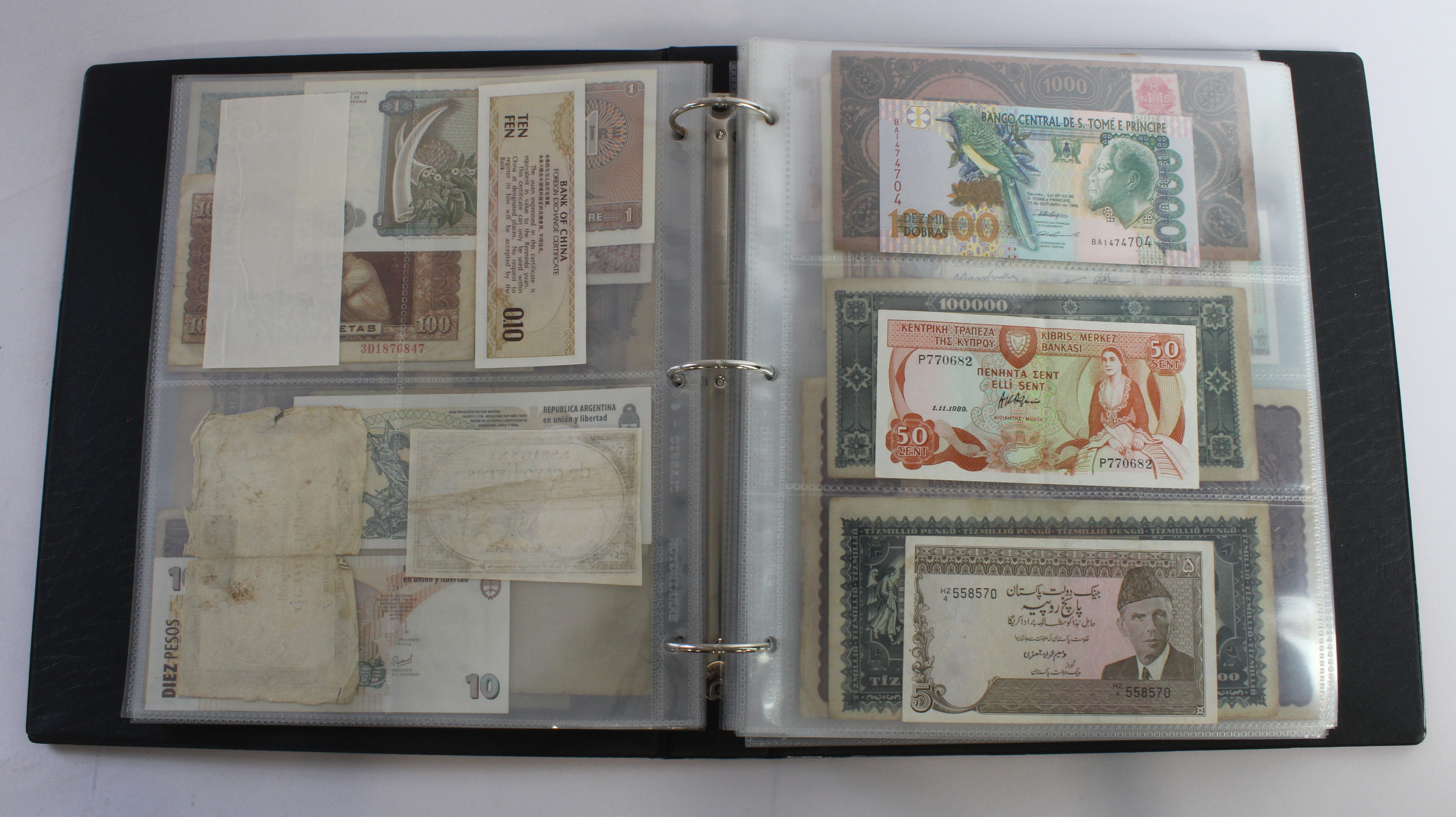 World (164), an album of mixed world notes to include USA fractional 50 Cents 1863, Hong Kong - Image 9 of 47