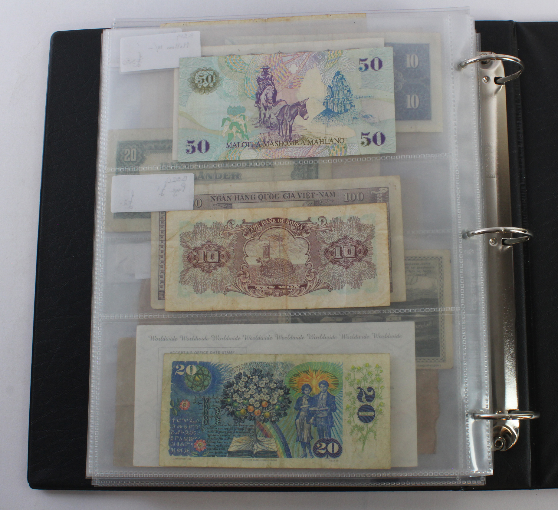 World (164), an album of mixed world notes to include USA fractional 50 Cents 1863, Hong Kong - Image 47 of 47