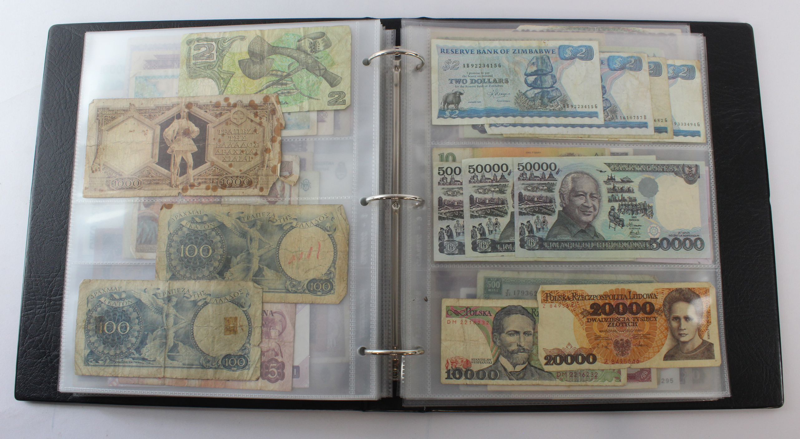 World (164), an album of mixed world notes to include a group of King George VI from East Africa, - Image 27 of 39
