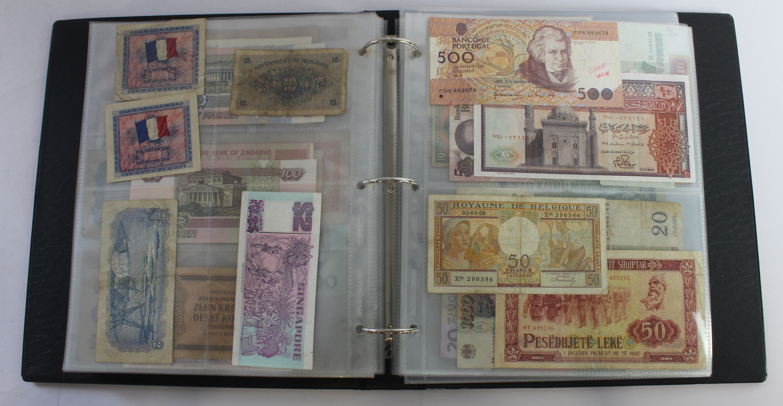 World (164), an album of mixed world notes to include USA fractional 50 Cents 1863, Hong Kong - Image 26 of 47