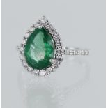 White gold (tests 18ct) diamond and emerald cluster ring, pear shaped emerald approx. 2.30ct,