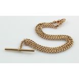 Rose gold (tests 9ct) double Albert pocket watch chain, curb links with T-bar suspended in the