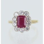 Yellow gold (tests 18ct) diamond and ruby cluster ring, one flux-filled step cut ruby measures