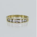 18ct yellow gold diamond half eternity ring, seven round brilliant cuts, TDW approx. 0.70ct, channel