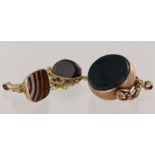 Three 9ct yellow gold fob pendants, stones include onyx, banded agate and bloodstone, total weight