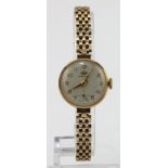 Ladies 9ct cased Marvin manual wind wristwatch. Hallmarked Edinburgh 1966. On a 9ct bracelet.