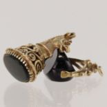 Two 9ct yellow gold fobs, a bloodstone set horse head and a onyx swivel, total weight 14.3g.