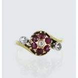 Yellow gold (tests 18ct) vintage diamond and ruby dress ring, six rubies each approx. 2.5mm, set