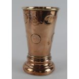Coin Goblet. A large polished copper cup set with George III Halfpennies, and engraved with a coat