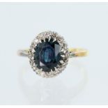 Yellow gold (tests 18ct) diamond and teal sapphire cluster ring, sapphire measures approx. 8mm x