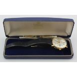 Gents 9ct cased Eterna-Matic wristwatch, hallmarked London 1962. The silver dial with gilt baton