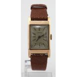 Gents 9ct cased Audax manual wind wristwatch, hallmarked London 1945. The rectangular dial with