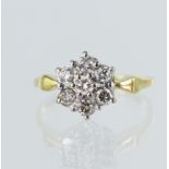 18ct yellow gold diamond daisy cluster ring, set with seven round brilliant cuts TDW approx. 0.56ct,