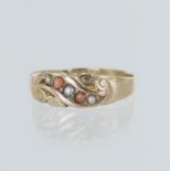 9ct Victorian coral and pearl ring, set with three seed pearls and two coral cabochons, hallmarked