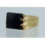 Yellow gold (tests 9ct) onyx signet ring, onyx measures 10mm x 11mm, finger size R, weight 11.5g.