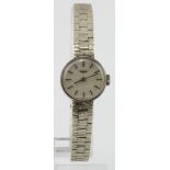 Ladies 9ct cased white gold manual wind Longines wristwatch. The signed 17mm dial with silver
