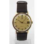 Gents 9ct cased Omega Geneve manual wind wristwatch. The cream dial with gilt baton markers, date