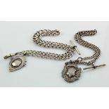 Two silver "T" bar pocket watch chains both with silver medals attached. Total weight 78.8g