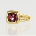 Yellow gold (tests 18ct) Rugiada rhodolite garnet dress ring, checker cut rhodolite measures approx.